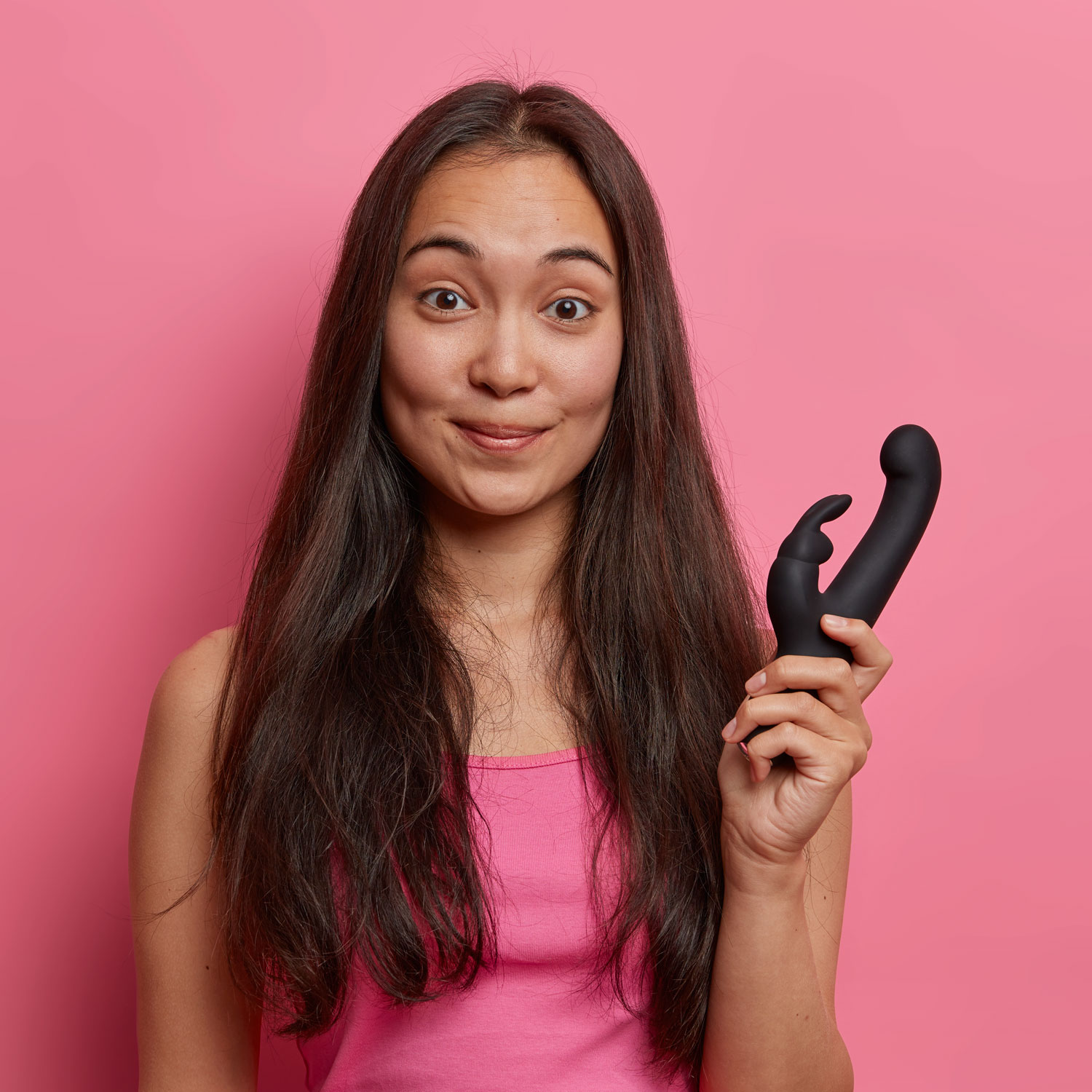 pleased-woman-with-eastern-appearance-holds-dildo-2022-02-08-06-03-41-utc.jpg